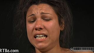 Hung Up Hottie Endures Rough Punishment in Garage