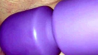 Young shaved girl fucks ass with vibrator on clit