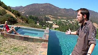 beautiful blonde girl enjoys pool time