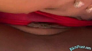 Check out this busty brunette in a bikini by the pool 😍