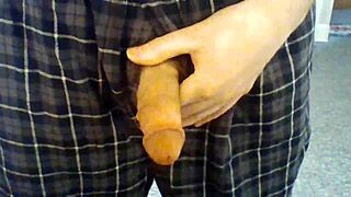guy playing with his open fly penis and precum