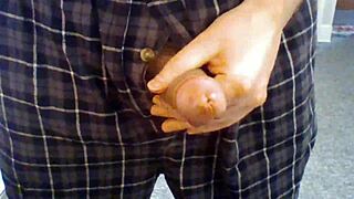 guy playing with his open fly penis and precum