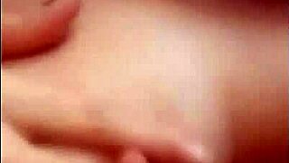 Girl dances seductive striptease on webcam. She rips clothes, undresses completely, and masturbates solo.