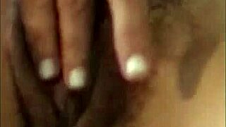 Slutty milf fingers hairy pussy as boyfriend films solo