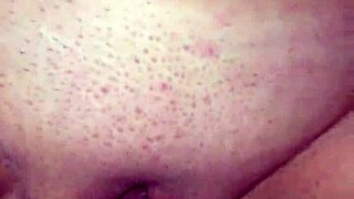 She takes the big dildo deep, fucking herself hard with toys in a casual scene.