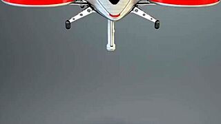 two cute teens playfully using strapon and dildo