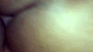 Bent over in doggystyle, this ebony babe takes a big black cock