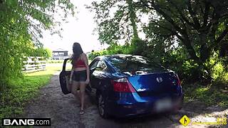 Cheating brunette girlfriend sucks mechanic's cock outdoors by the car.