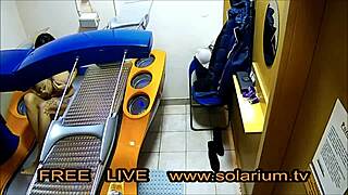 Hot blonde masturbates in a public tanning salon with hidden cam