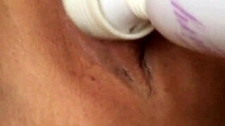 asian milf masturbates her shaved pussy
