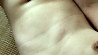 asian milf masturbates her shaved pussy