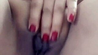 Pornstar poosoo plays with pussy