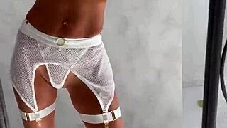 Monika fox poses in front of the mirror before shooting