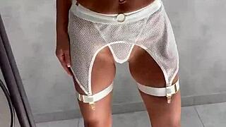 Monika fox poses in front of the mirror before shooting