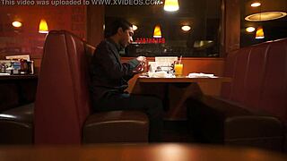 Indian Guy Enjoys American Breakfast in Public Outdoor Setting