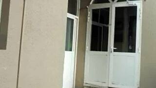 an indian couple shares intimate moments in their home