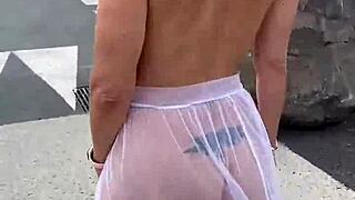 Naughty crossdressing slut flashes on beach