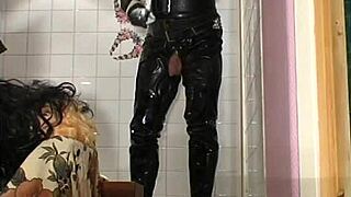 In this retro blue film, Roxina interacts with her turbo doll in a toilet setting, captured in XXL WMV format for detailed viewing.