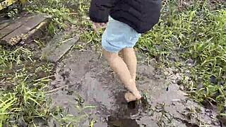 Muddy feet exploration in swampy bog