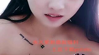 I watch this Asian amateur girl perform a strip show.