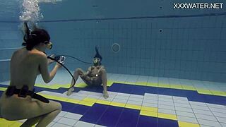 Hungarian pornstar Adeline enjoys a public swim with a girl