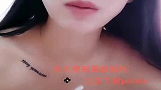 I watch this Asian amateur girl perform a strip show.