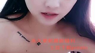 I watch this Asian amateur girl perform a strip show.