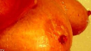 i spyed on my wife in the shower n got caugt with her shaved tits