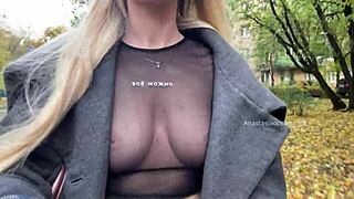 Wow, check this girl flashing her boobs while strolling through the city streets. She’s a daring exhibitionist on a public beach!