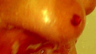 i spyed on my wife in the shower n got caugt with her shaved tits