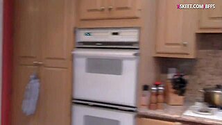 Sweet babes sharing a dick in the kitchen