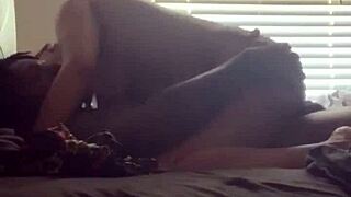 Ebony couple shares intimate moments in their private home