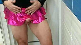 this tranny in sexy leotard and shiny skirt looks hot 😍