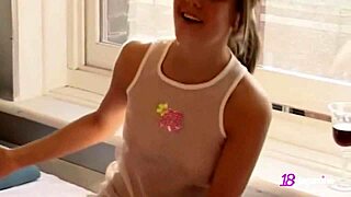 Petite Andi Pink Flashes Shaved Cunt While Eating Popcorn