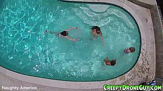 Lesbians Filmed By Drone In Pool Outdoors