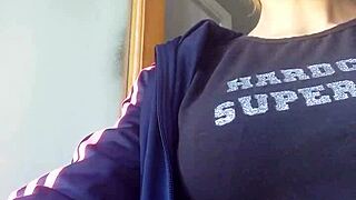 Blonde Model Smokes Seductively in Fetish Scene