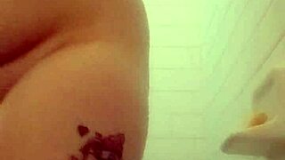 brunette bathing in the shower