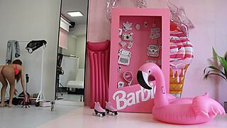 Barbie doll in red lingerie posing