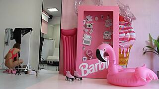 Barbie doll in red lingerie posing