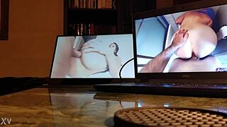 Guy masturbating at his desk with computer