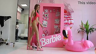 Barbie doll in red lingerie posing