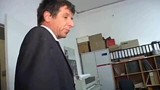 Horny German secretary handles two big cocks at office