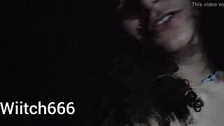 Brunette novinha shows off tits and ass outdoors.