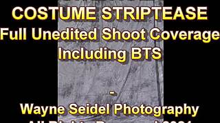 Raven Rae performs a costume strip tease on stage