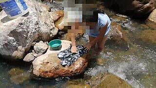 Washing In A River
