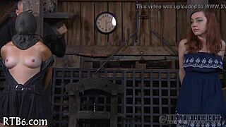 four gals squeezed into a tiny cage