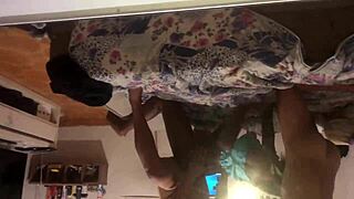 The man films his wife with another.