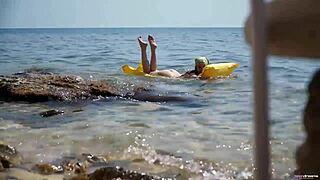 sirena enjoys a solo activity at the beach, exploring her body to find release