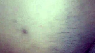 Late night fuck with a hot babe in the bedroom.