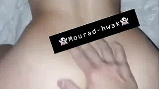 Fucking the beurette bent over in doggystyle.